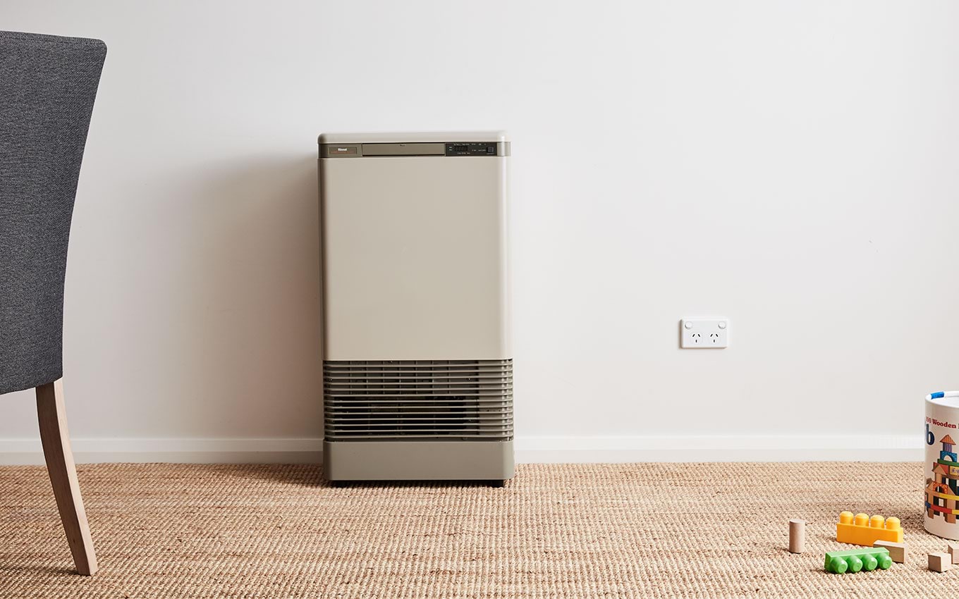 A photograph of a gas heater in a modern home.