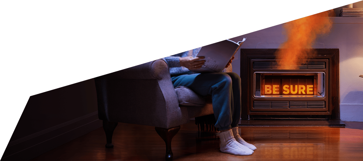 A corner graphic using a photograph of a person reading in a chair next to a faulty gas, it's heating element reads 'Be Sure'.